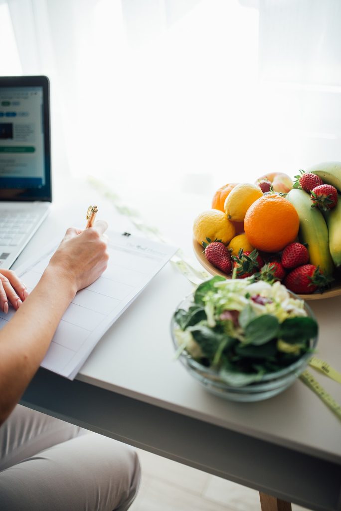 Oral Weight-Loss Drugs Take Centre Stage Ahead of ObesityWeek 2026 Healthy meal planning with fresh fruit, salad and a notebook